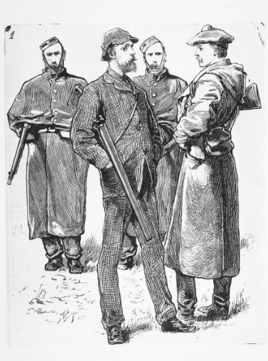 An Captaen Boycott agus a thionlacan ag coinneáil gunnaí gráin