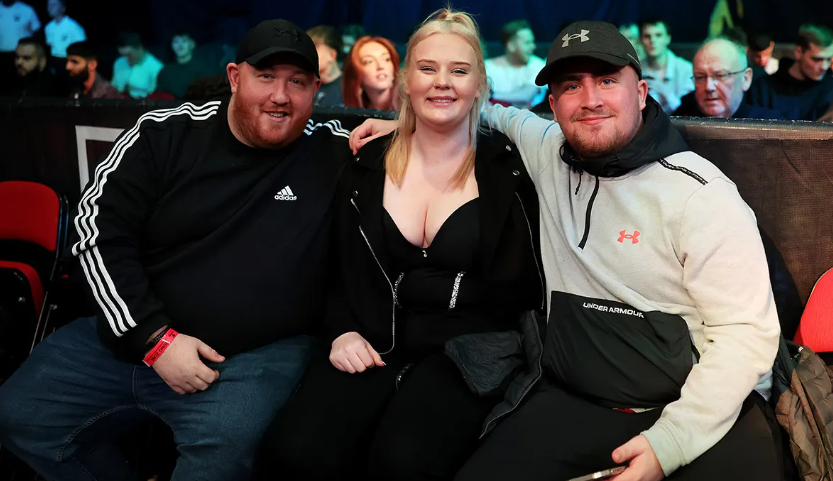 Luke Littler agus Eloise Milburn. Pictiur Getty Images