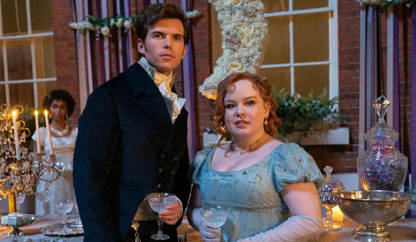 Nicola Coughlan agus Luke Newton ar Bridgerton. Pictiur Liam