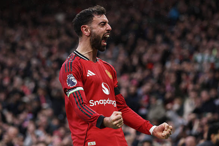 Imreoir Manchester United Bruno Fernandes a thagann ón bPortaingéil