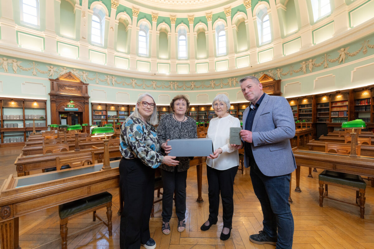 NLI Director Dr Audrey Whitty Mary McGillick and Mairead Bolger granddaughters of Patrick M Foley and Dara O Cinneide with the donation of Foelys writings to the NLI archive